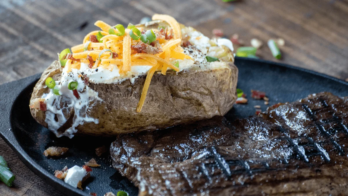 loaded baked potato with steak