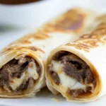 Easy Sheet Pan French Dip Tortilla Roll-Ups