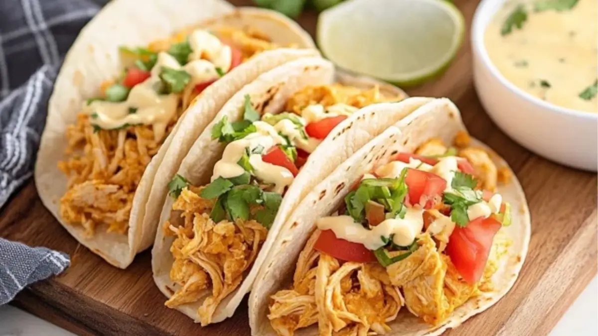 Easy Slow Cooker Queso Chicken Tacos