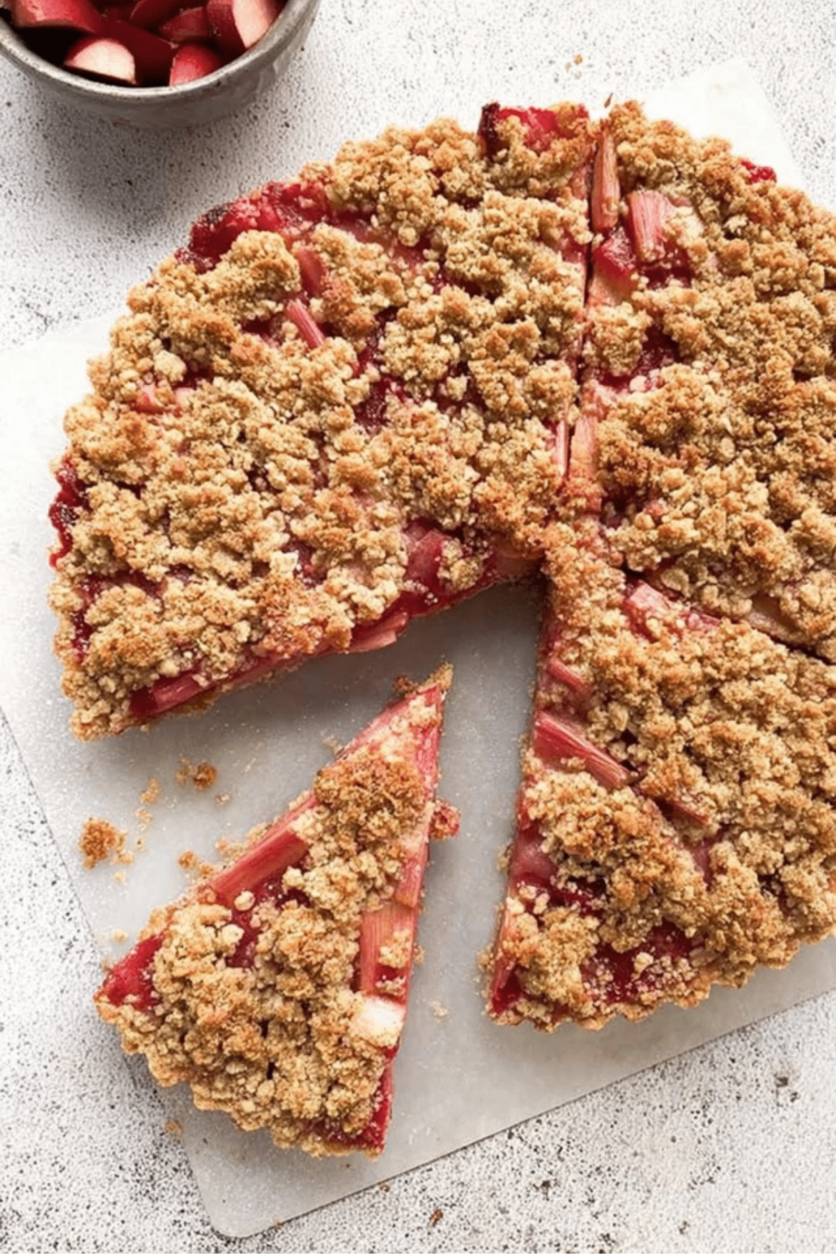 Keto Rhubarb Crumble Tart with almond flour crust and crumble topping