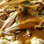 Shredded Chicken Gravy Over Mashed Potatoes
