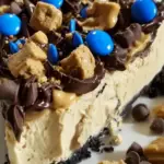 Monster Cookie Peanut Butter Cheesecake Pie