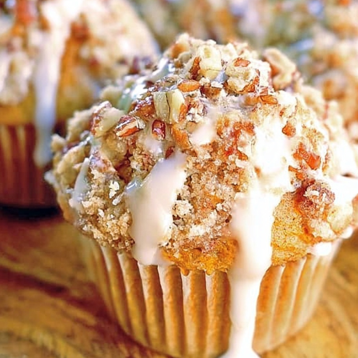 Iced Maple Pumpkin Pecan Streusel Muffins